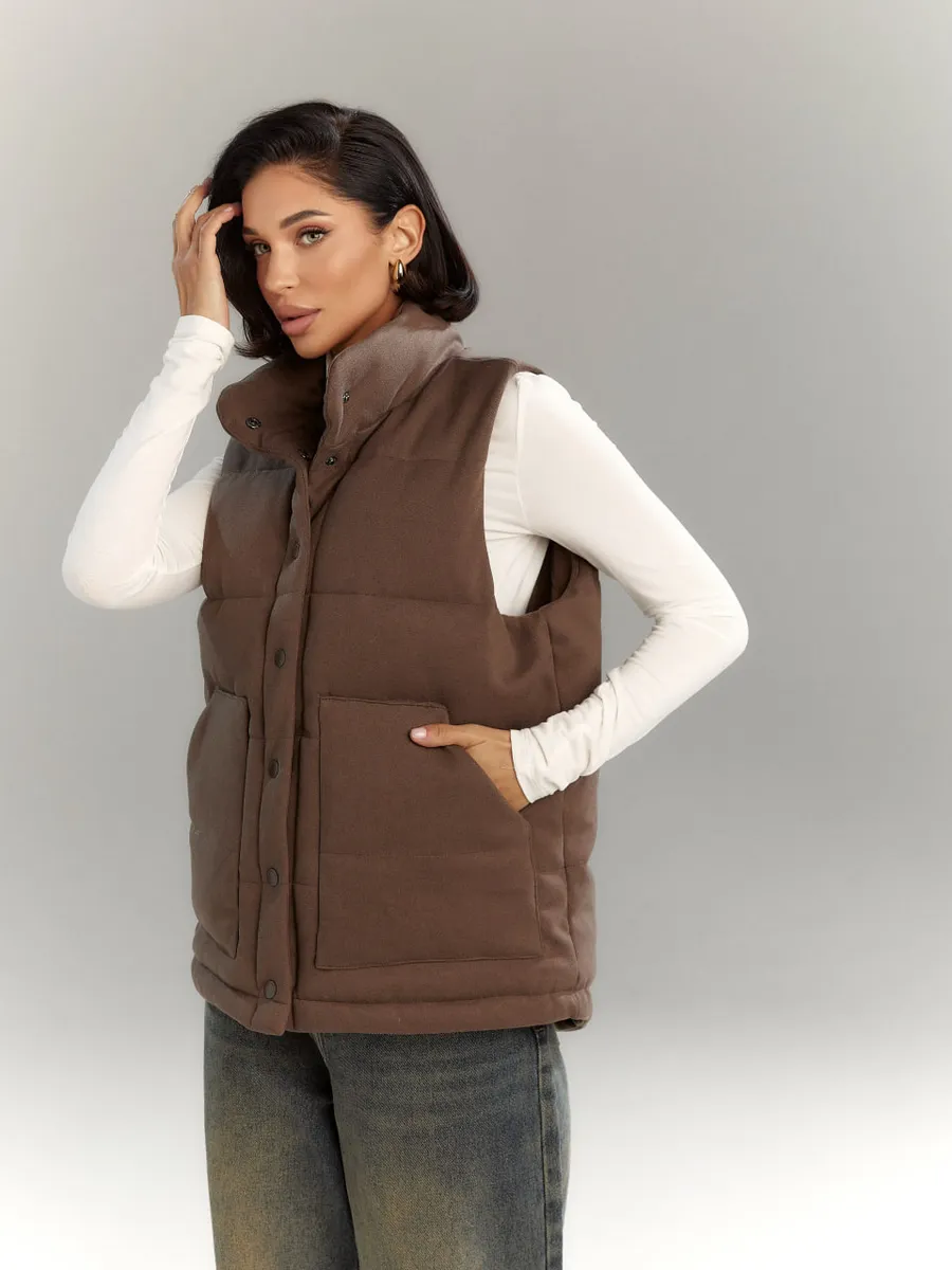 Утеплённые жилетки для стильной осени